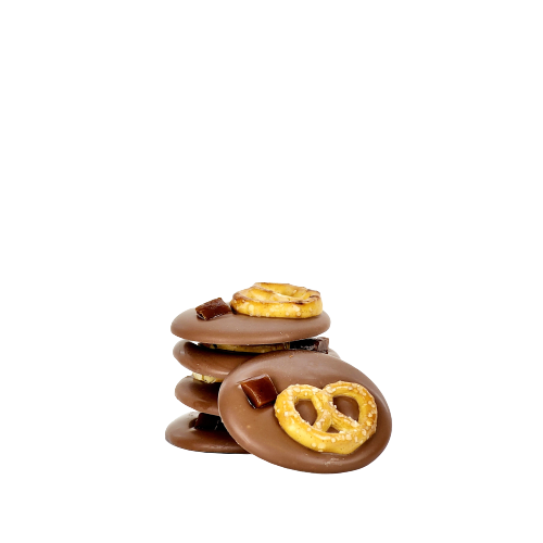 A pile of 5 milk chocolate disks topped with pretzel and a small piece of caramel